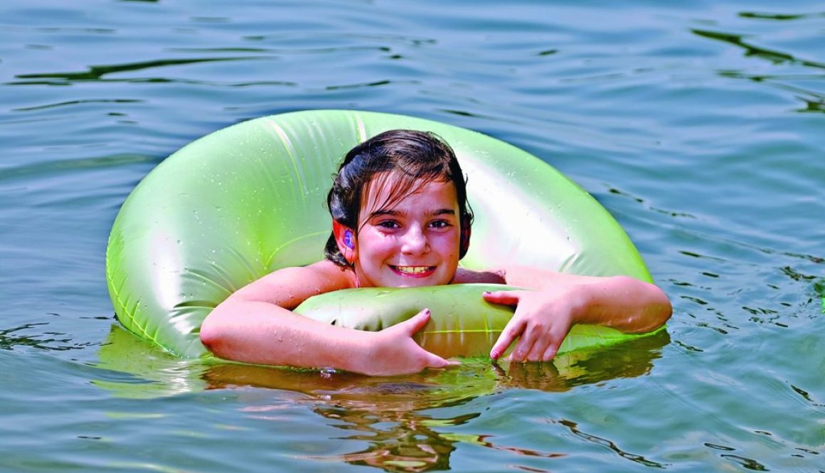 Cute Girl Floating in Water