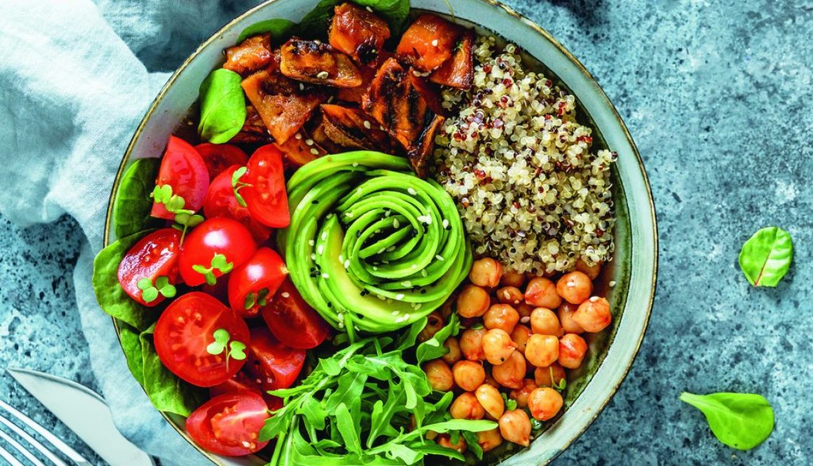 Buddha bowl salad with baked sweet potatoes, chickpeas, quinoa,