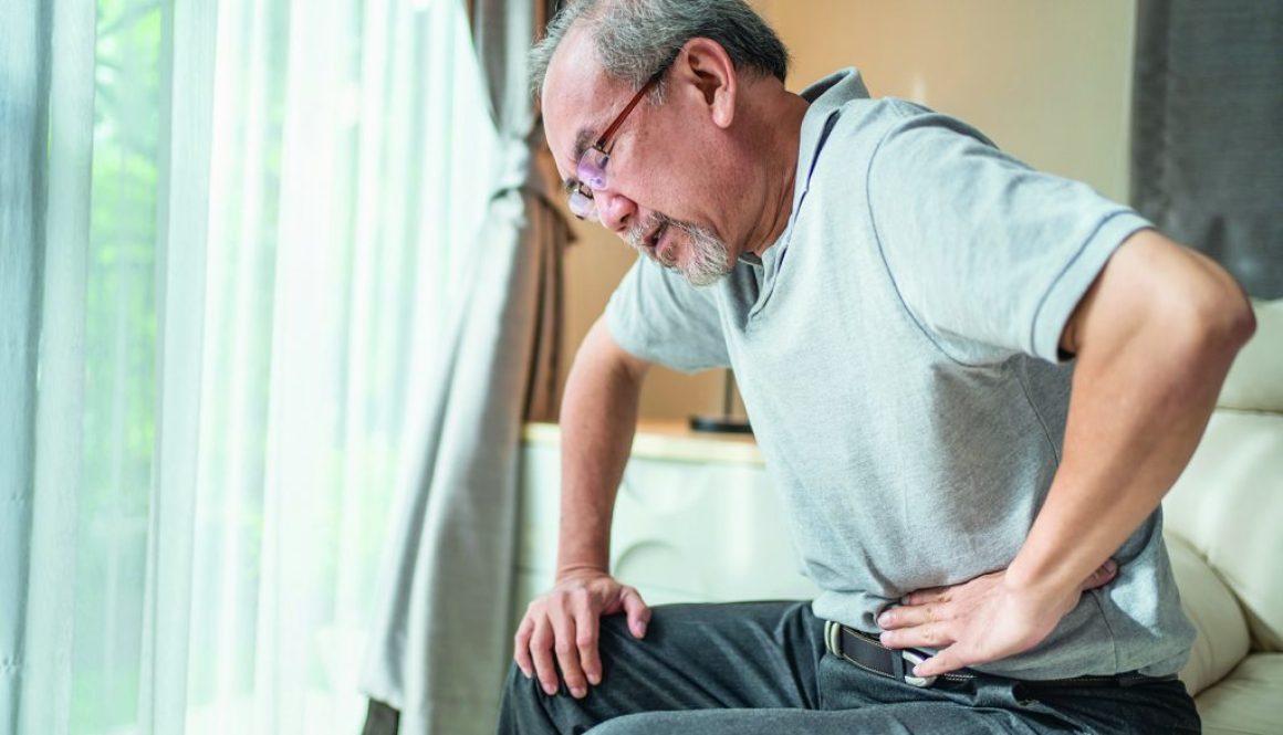 Asian Senior elder man feel suffer from terrible stomach ache at