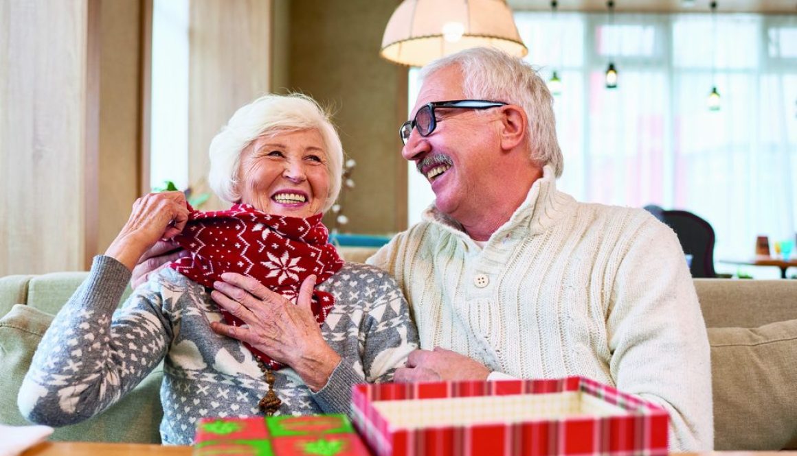 Laughing Senior Couple Enjoying Christmas