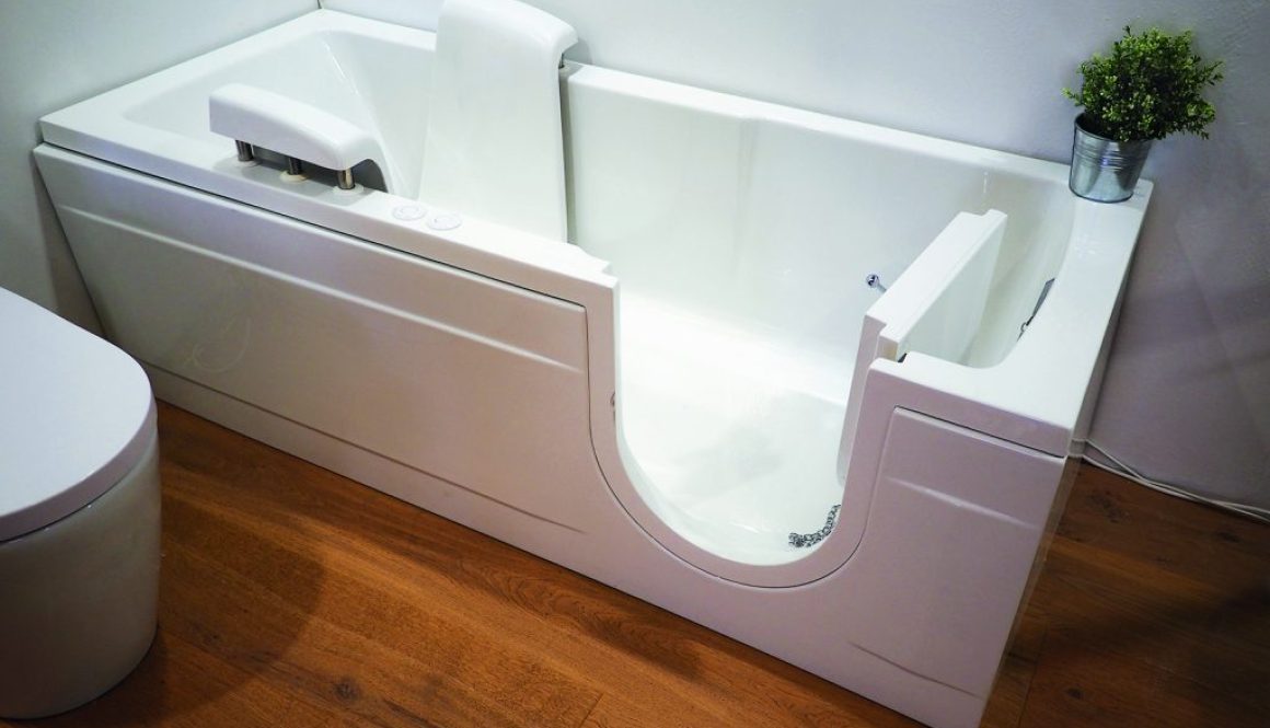 Handicapped disabled access bathroom bathtub with electric handl